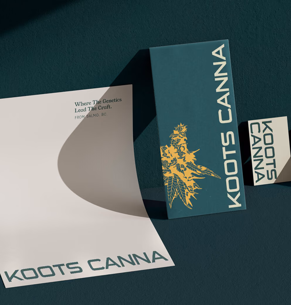 Koots Canna branded stationery set featuring business cards, packaging, and printed materials in deep green and cream tones.