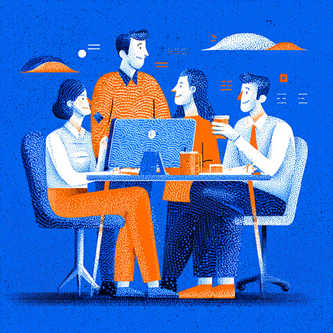 Creative team gathered around a computer discussing ideas, representing collaborative website design, UX strategy, and modern agency workflows.