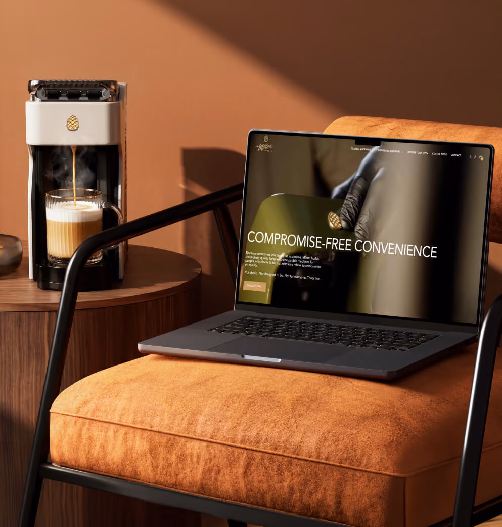 Milton Coffee website mockup displayed beside a premium coffee machine in a warm lifestyle setting.