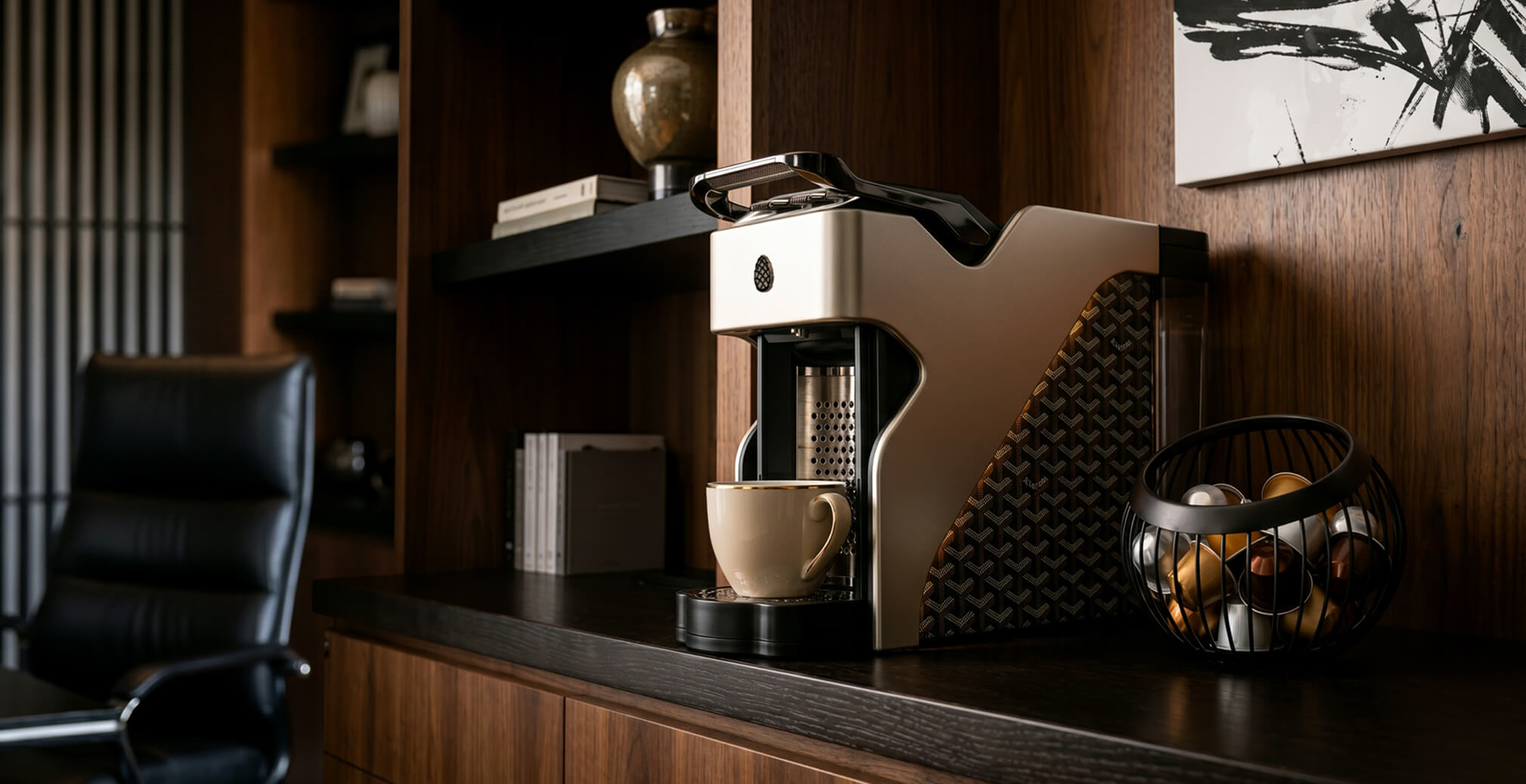 Luxury Milton Coffee machine positioned on a dark wood shelf in an executive office, showcasing premium materials, modern craftsmanship, and elegant product design.