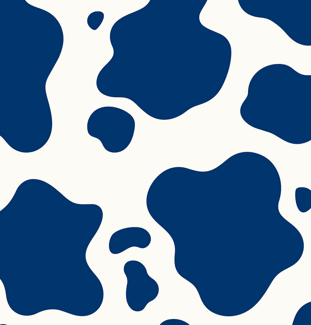 Blue-and-white cow print pattern developed for the Whipché brand identity, inspired by dairy heritage and playful visual storytelling.