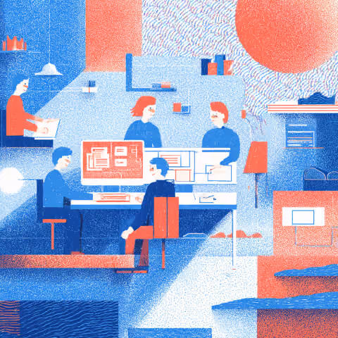 Team collaborating around computer screens in a modern workspace, illustrating the design and development process behind website creation.