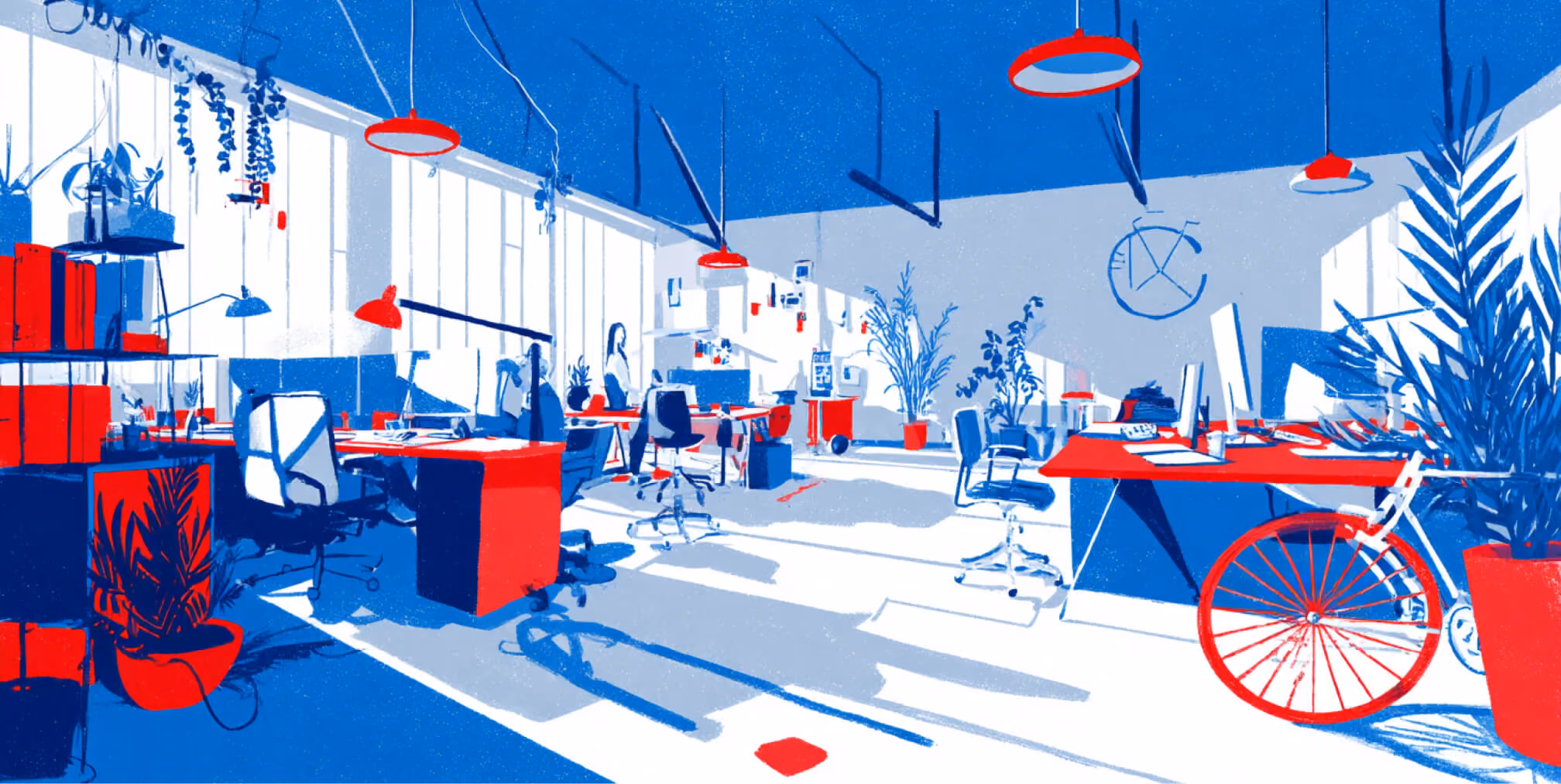 Modern digital marketing agency workspace with collaborative desks, creative tools, and open office design, representing integrated marketing, branding, and growth strategy services.