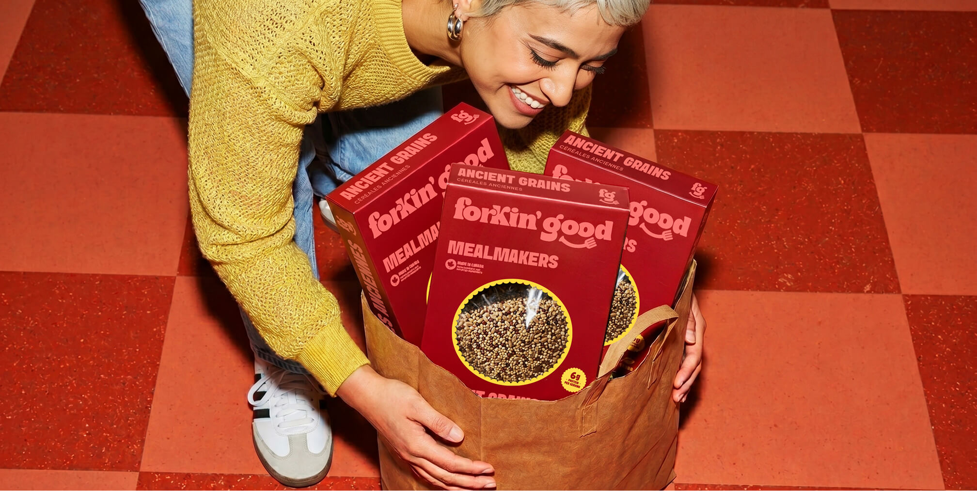 Lucent Sun vitamin gummy packaging displayed on a striped beach chair, illustrating lifestyle-focused packaging design that communicates product personality and target audience appeal.