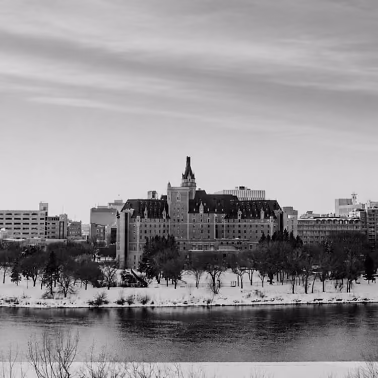 The historic Delta Bessborough Hotel overlooking the South Saskatchewan River in winter.