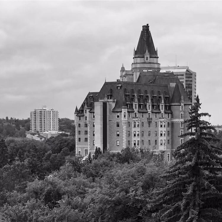 The iconic Delta Bessborough Hotel rising above the South Saskatchewan River valley in Saskatoon.