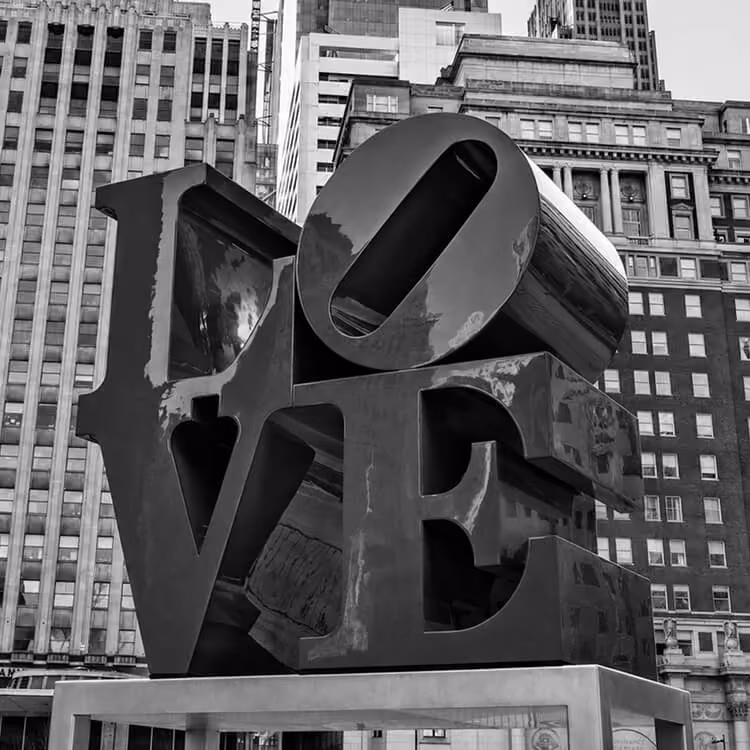 The iconic LOVE sculpture in Philadelphia’s JFK Plaza surrounded by downtown architecture.