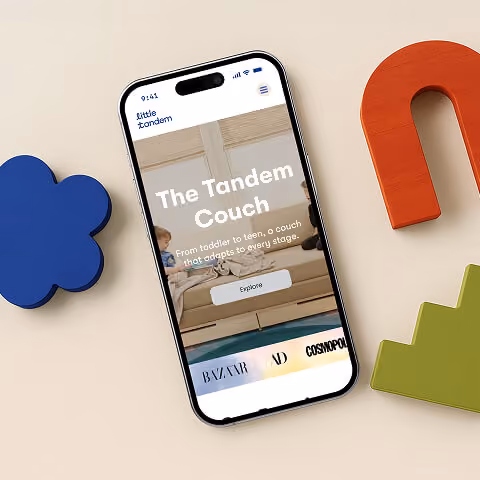 Mobile ecommerce website displayed on a smartphone showcasing a clean Shopify storefront with responsive design, intuitive navigation, and conversion-focused user experience.