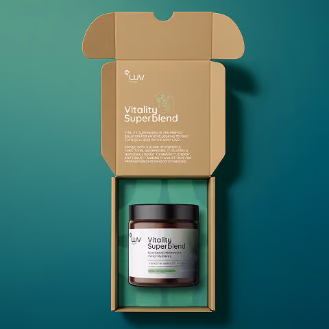 Open supplement box showcasing branded functional mushroom powder packaging and premium unboxing experience.