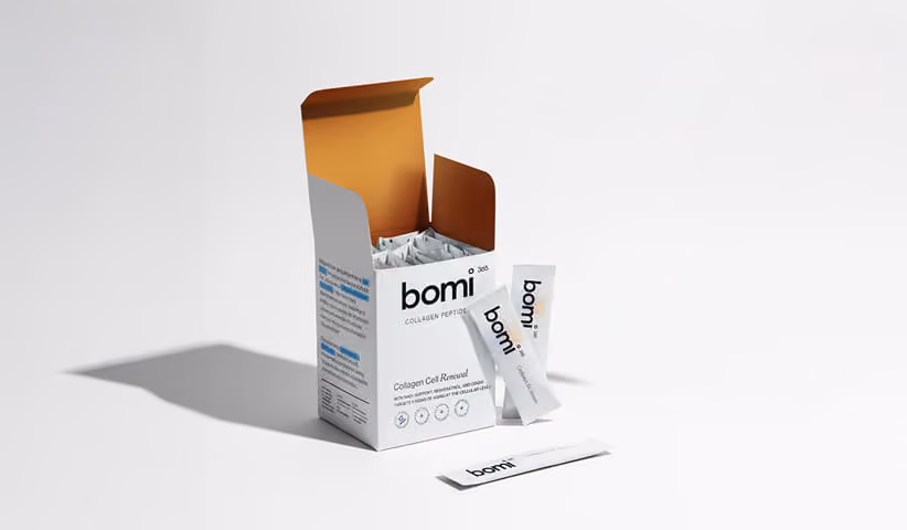 Branded collagen peptide stick packs displayed in premium retail packaging.