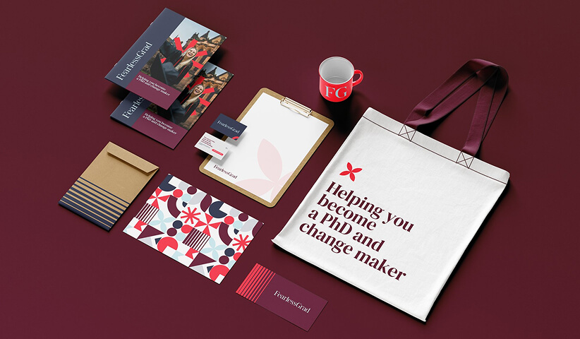 University branded stationery collection featuring tote bag, brochures, business cards, notepad, and promotional marketing materials.