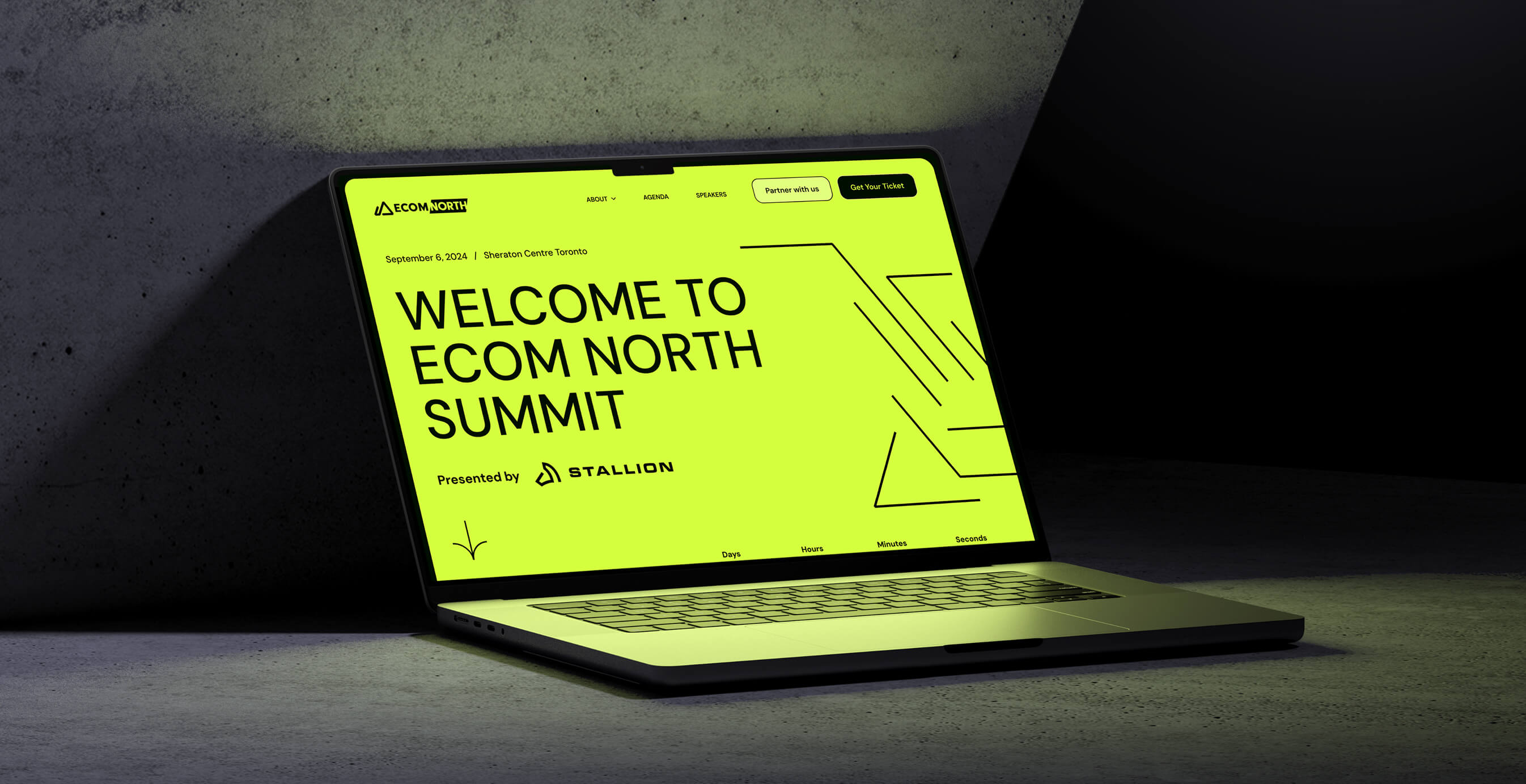 Ecom North Summit event website displayed on a laptop with bold neon yellow branding.