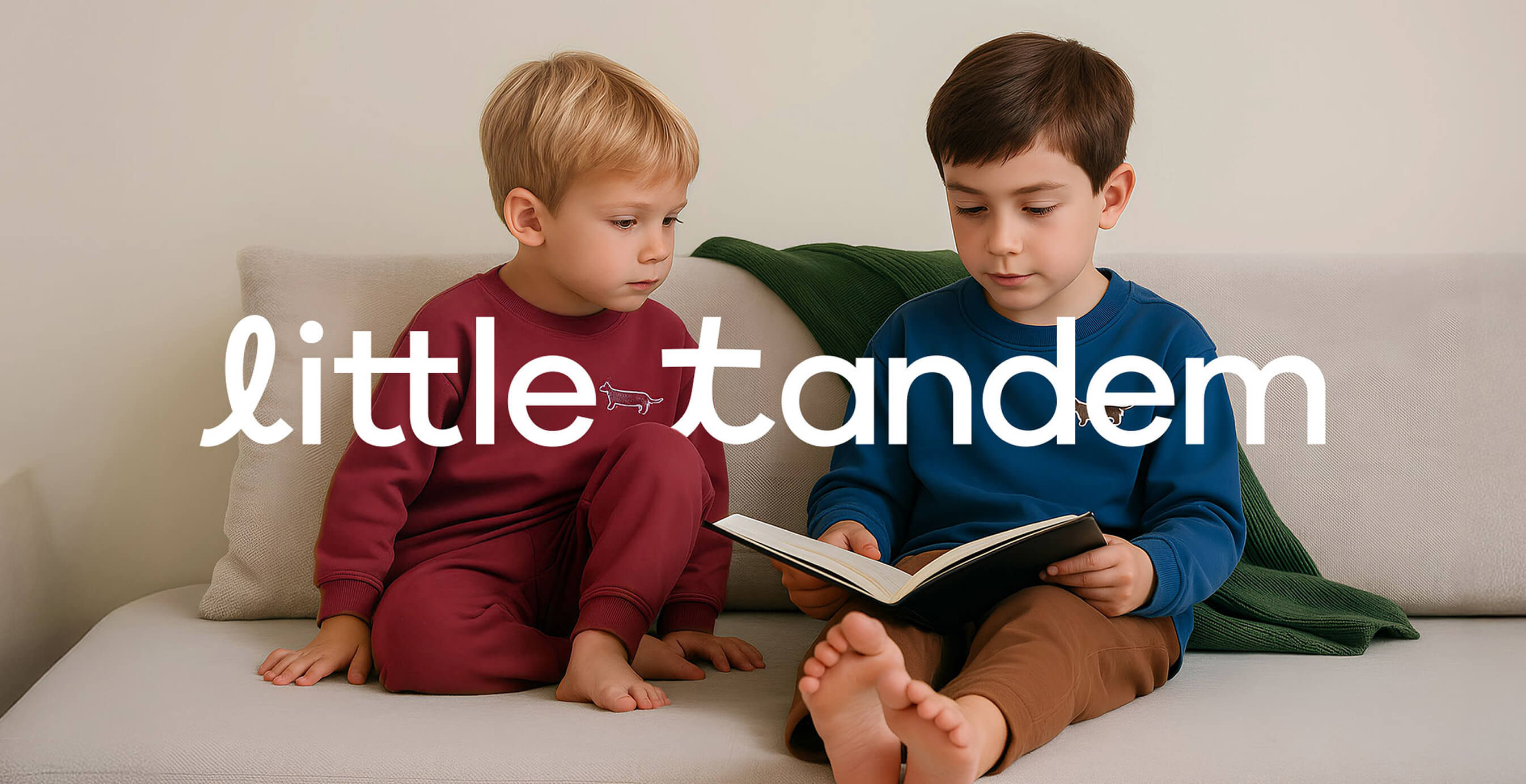 Little Tandem children’s brand visual with two boys reading together on a sofa.