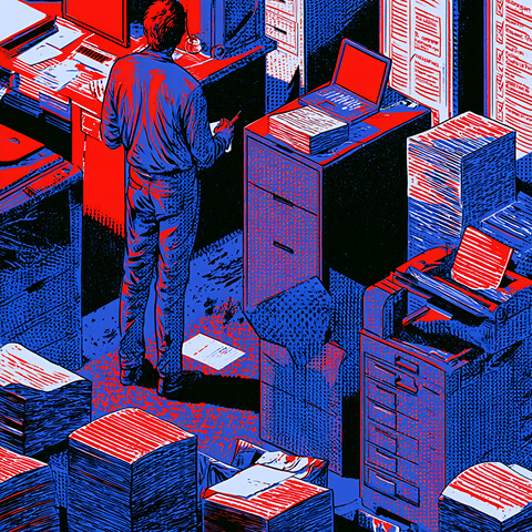 Professional surrounded by stacks of documents, computers, and research materials, illustrating the work behind building authoritative content and links.