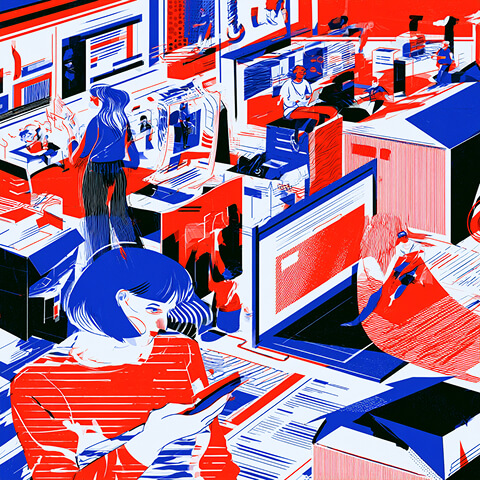 Designers working across screens, printed layouts, and visual references, illustrating the research, experimentation, and creative development behind building a brand identity.