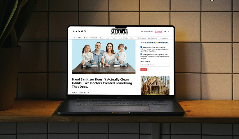 Laptop displaying a City Paper article about NOWATA rinse-free soap and its alternative approach to cleaning hands.