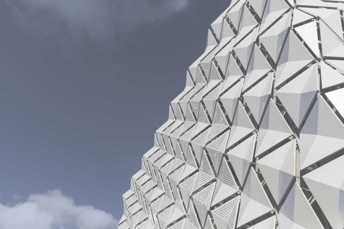 White faceted facade against the sky, representing the standard of care owed under a discretionary mandate