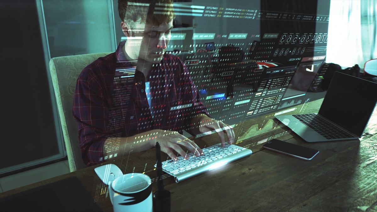 Cybersecurity analyst monitoring AI system data and network activity on a computer interface
