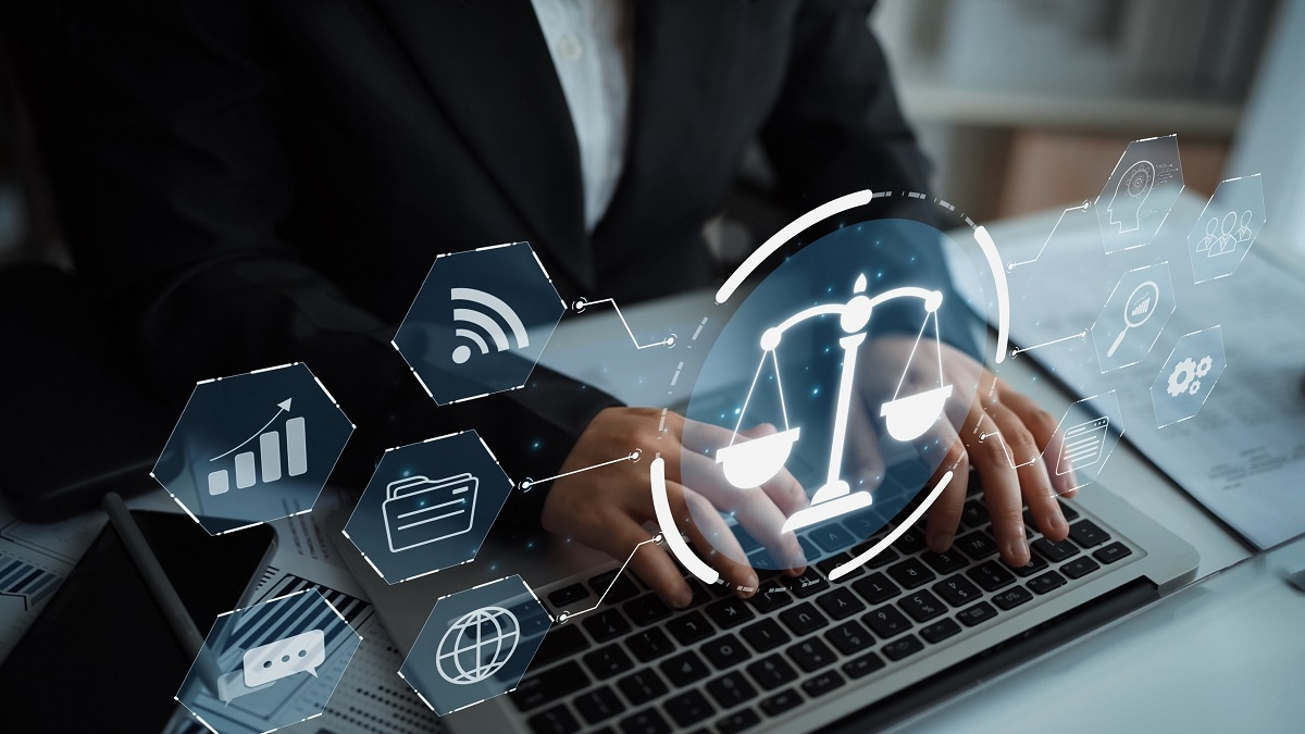 Digital icons representing AI regulations overlaid on a photo of a person typing on a keyboard