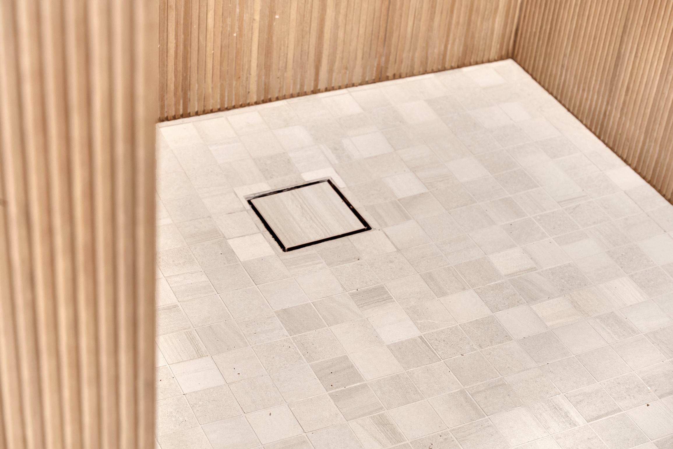 Newly installed tile for shower flooring in Salt Lake City