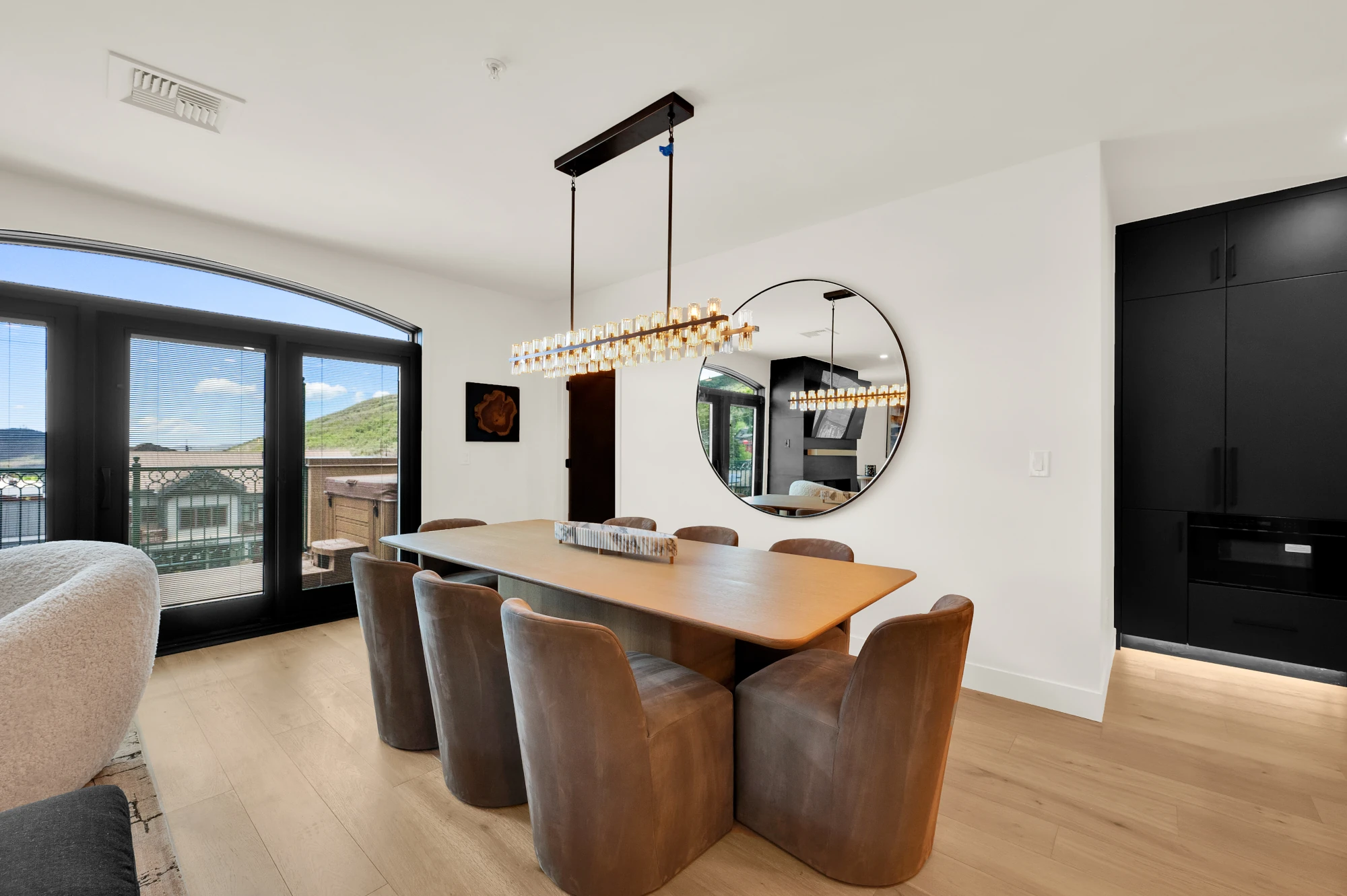 Dining table and chairs added as part of a kitchen remodel, blending function and style