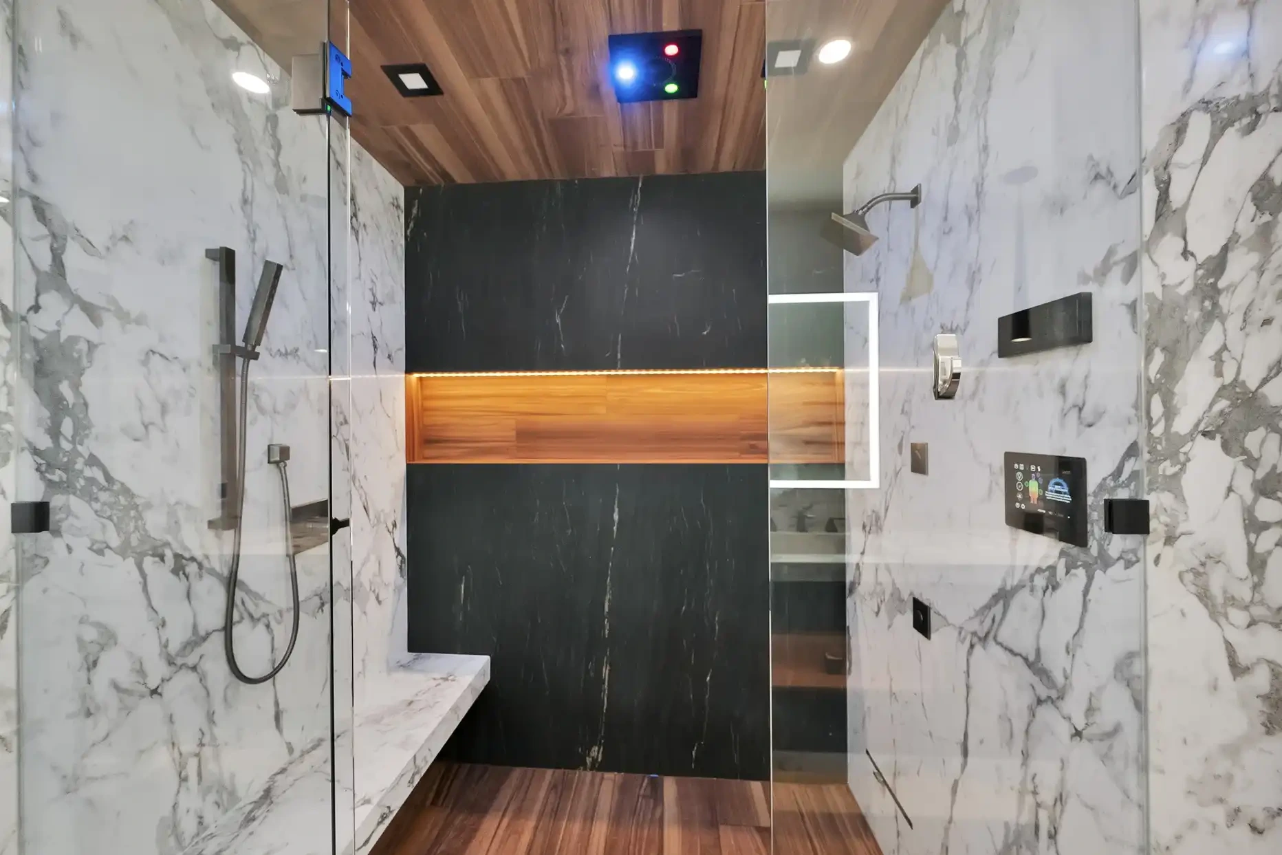Luxury bathroom with patterned flooring and freestanding tub 