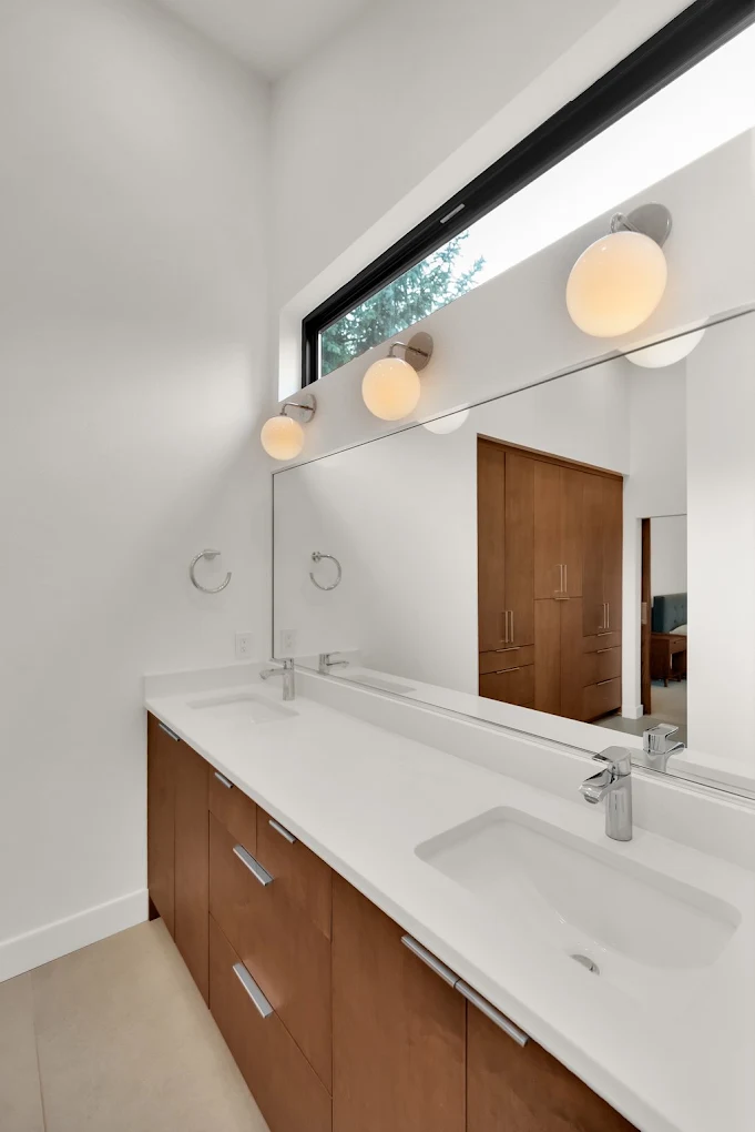 Furniture-style vanity with double sink in a Utah bathroom remodel