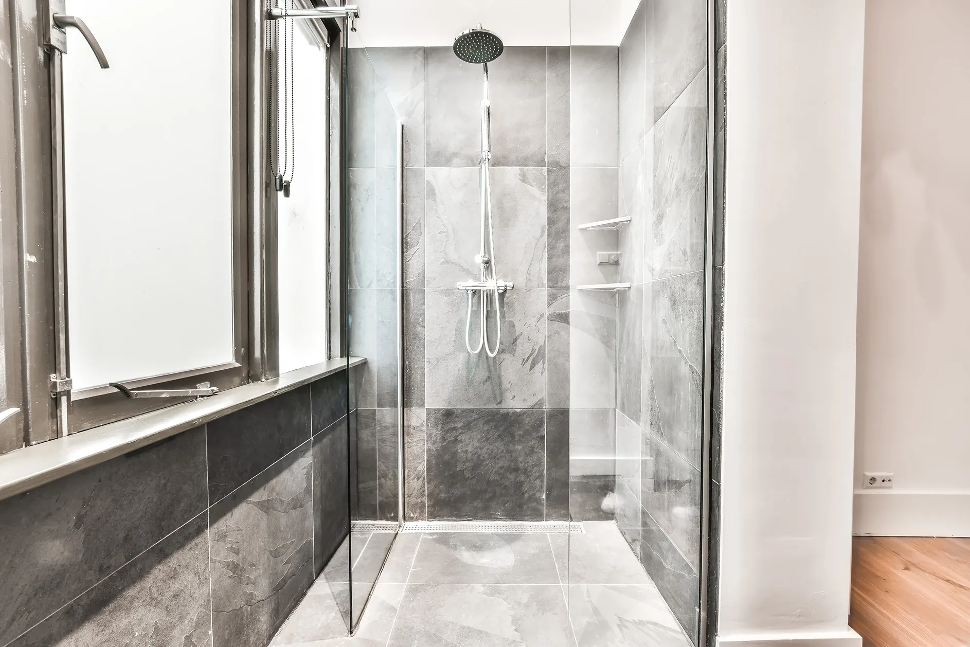 Curbless walk-in shower in Salt Lake City with large-format tile