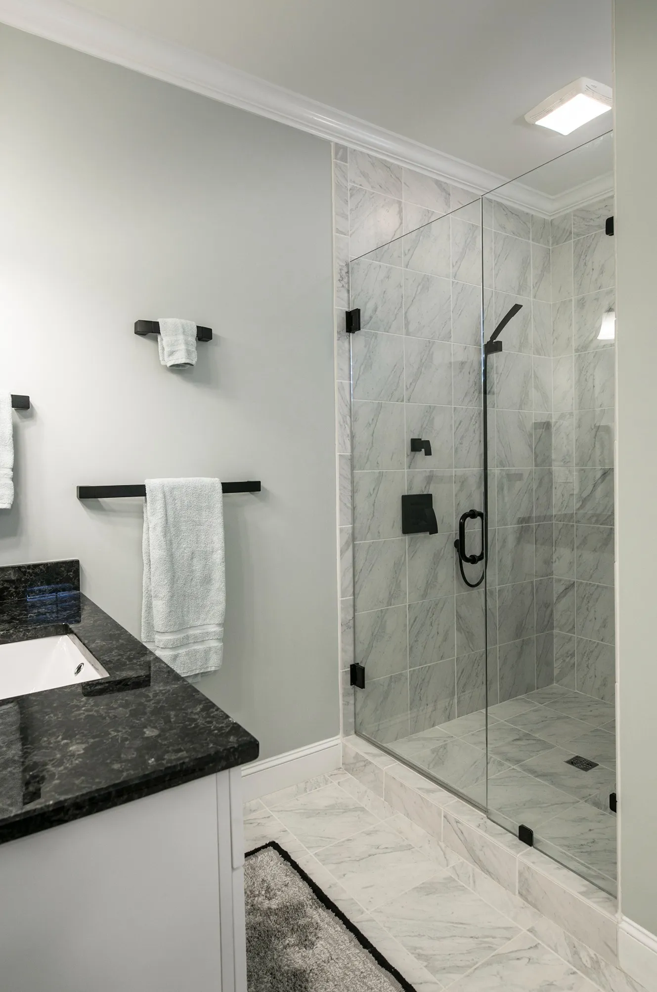 Frameless glass walk-in shower in a Salt Lake City primary bathroom