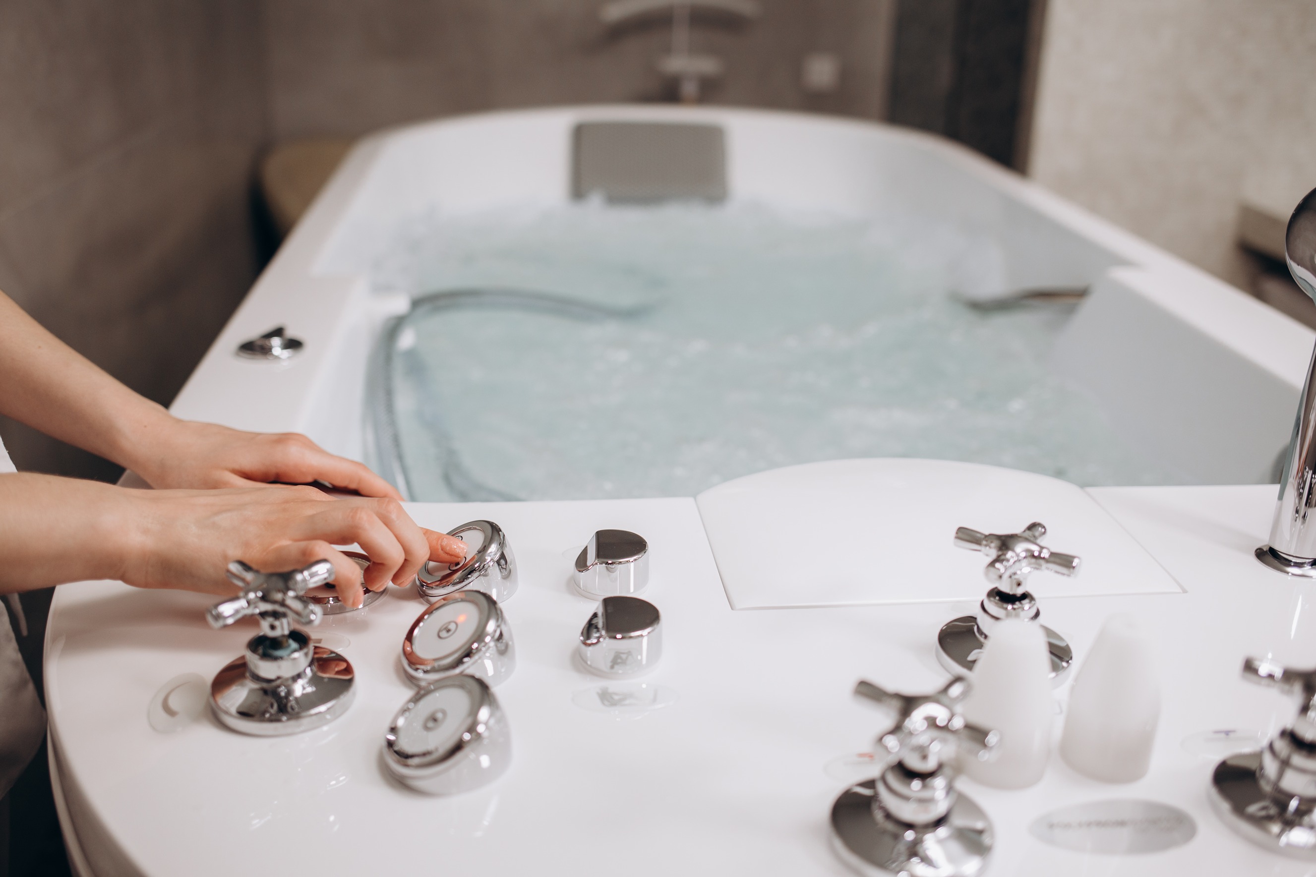 Walk-in tub being filled hot water using smart controls in Salt Lake City