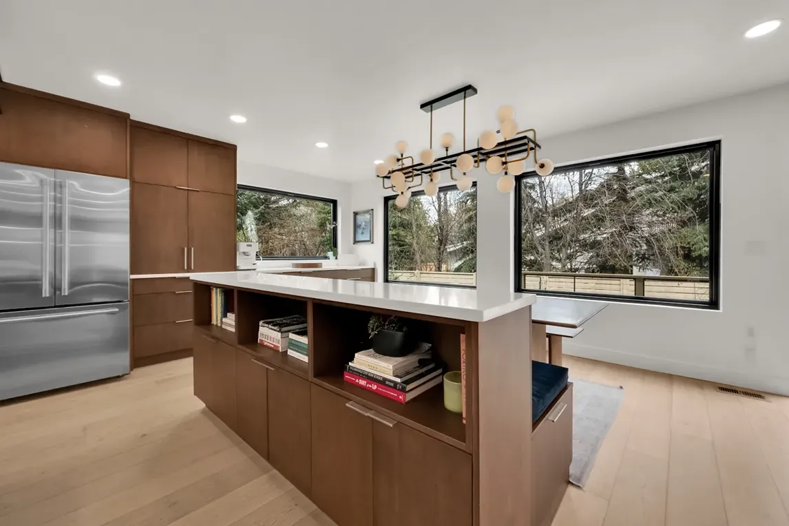 Large natural stone flooring near furniture style cabinetry in Salt Lake City