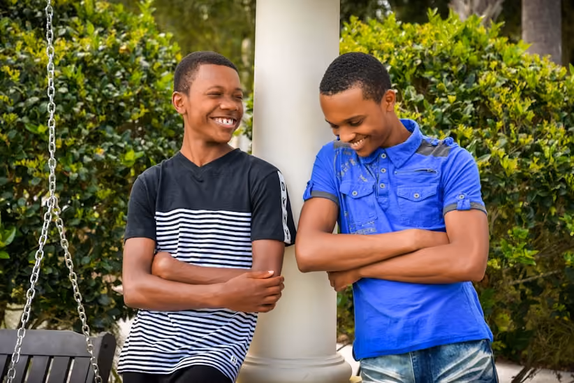 2 Boys smiling and laughing together