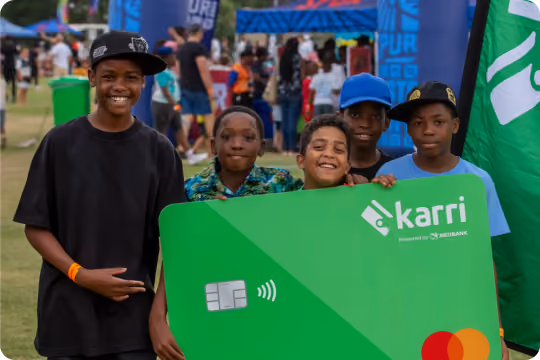 Kids holding a big Karri Card