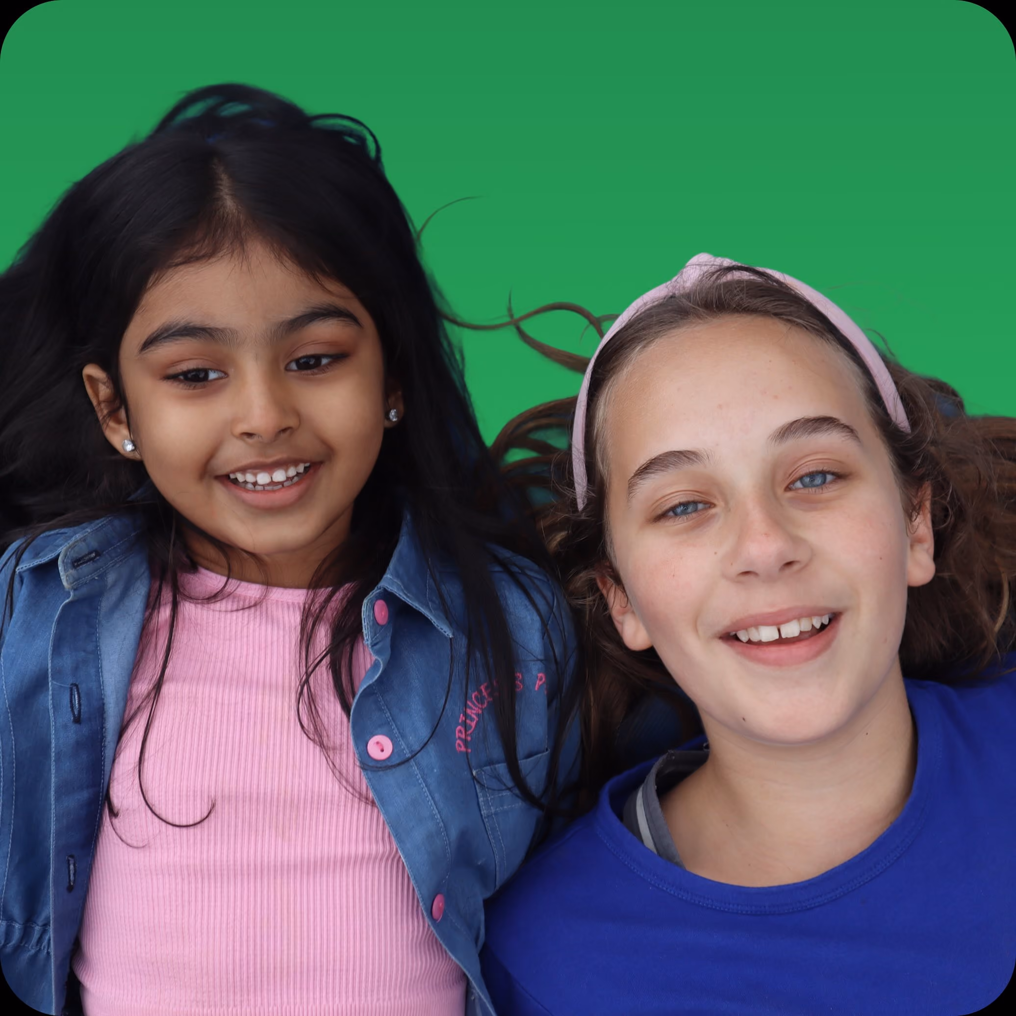 2 Girls lying on the floor