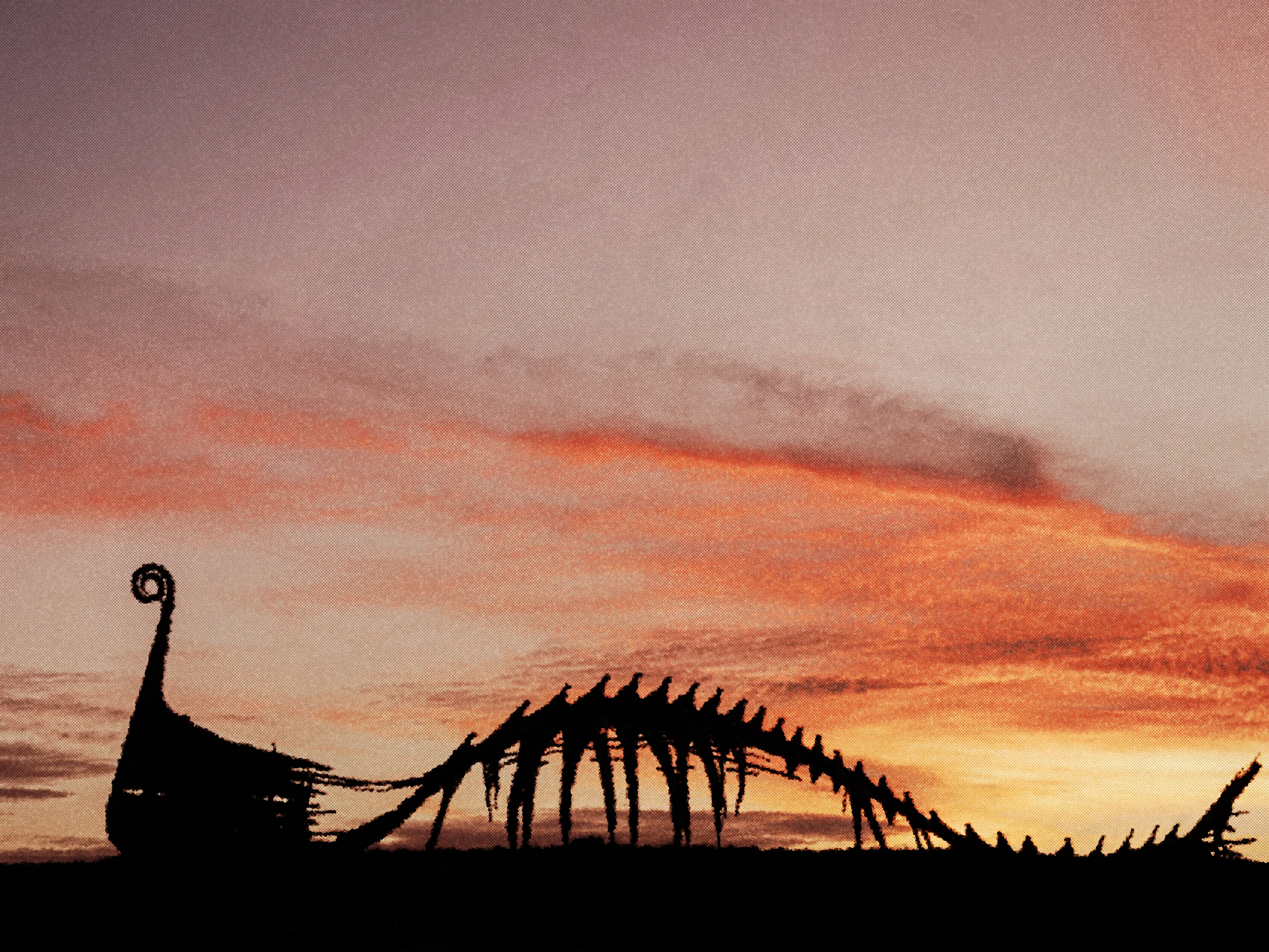 Silhouette of a large Viking ship bone structure against a colorful sunset sky.