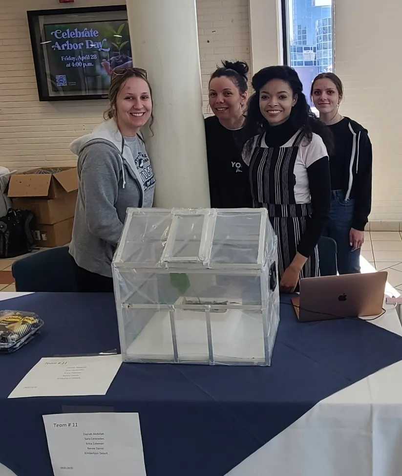 A picture of Kimmie with her engineering fair team.