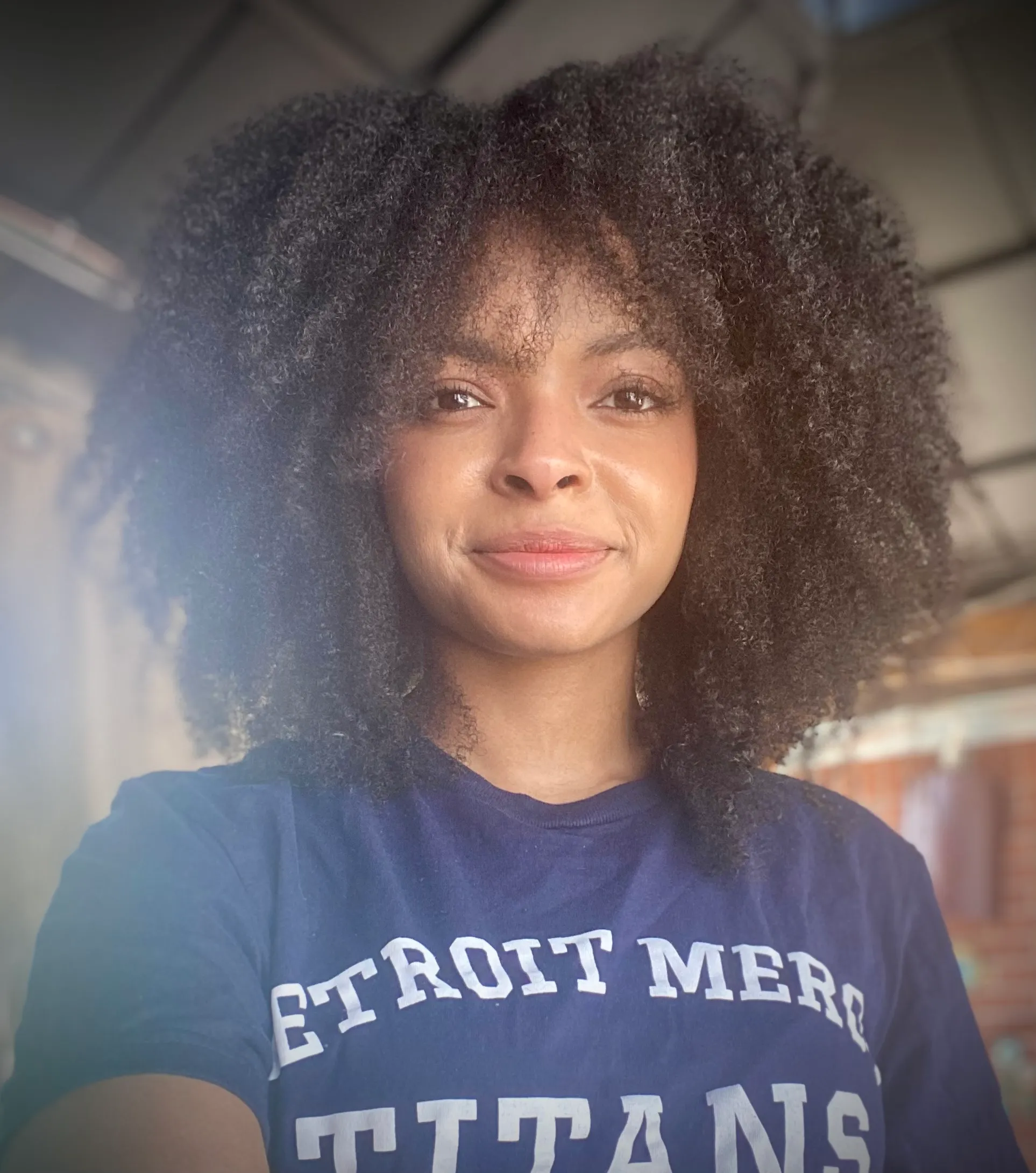 Kimmie in University of detroit Mercy T-shirt