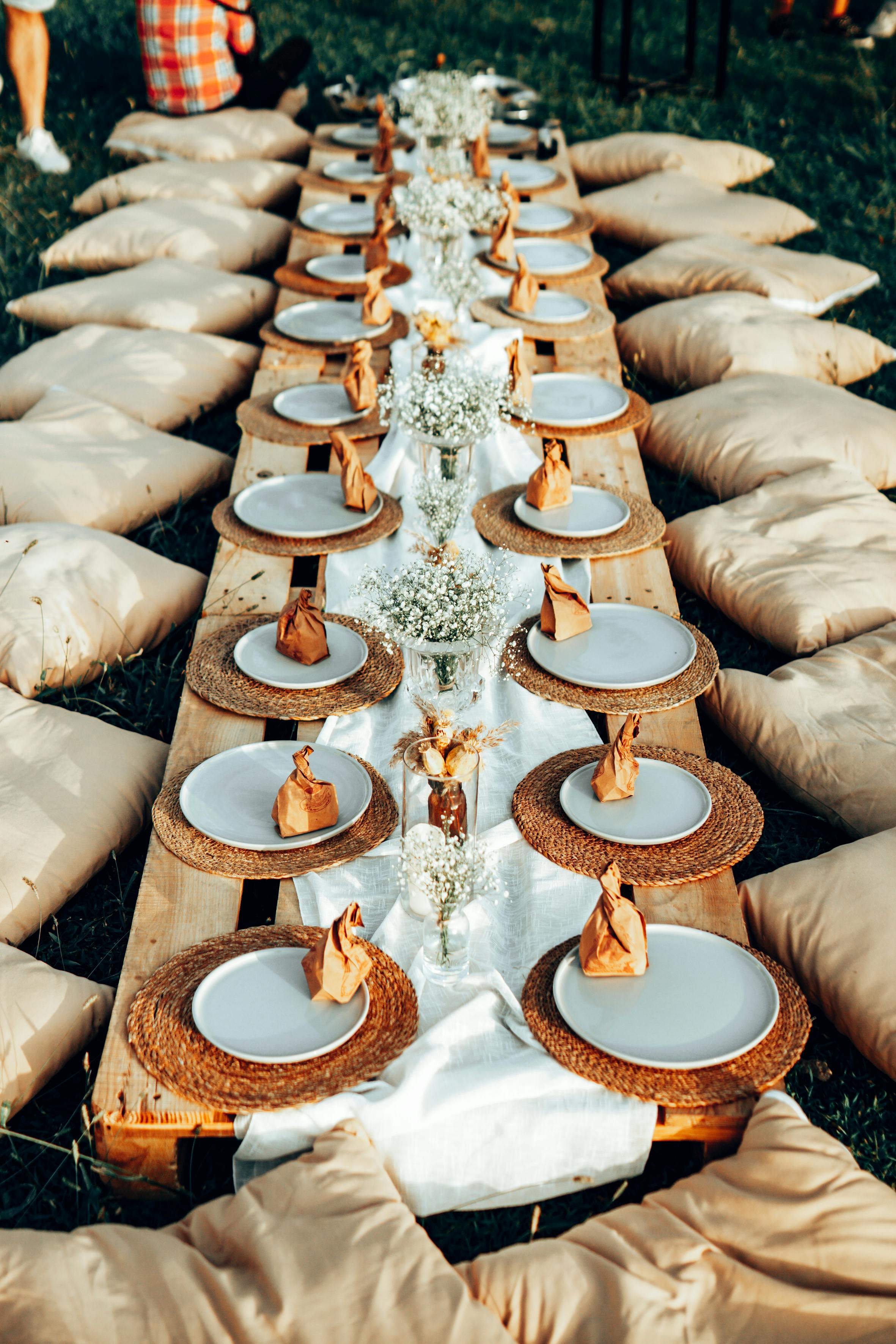 outdoor private dinner party on the floor on pillow