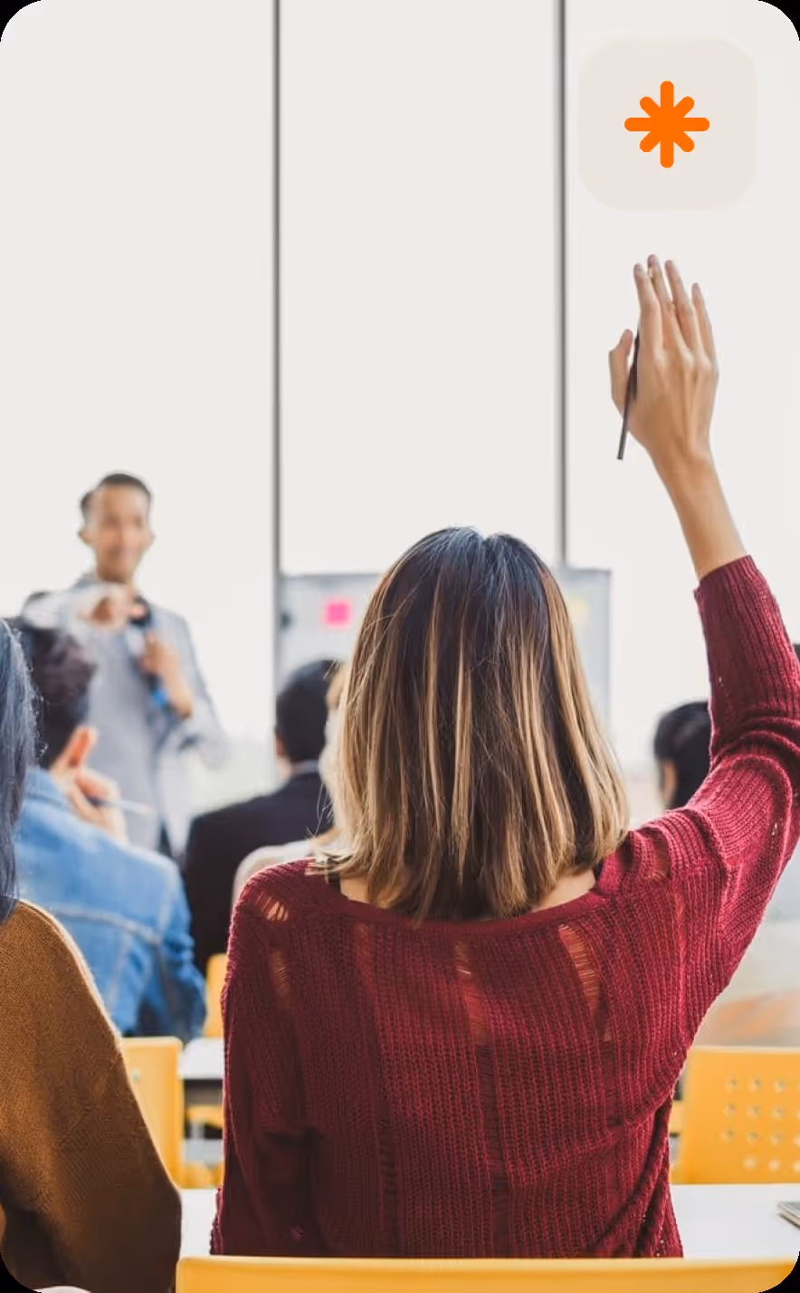 Corporate trainer leading a session at a professional training venue