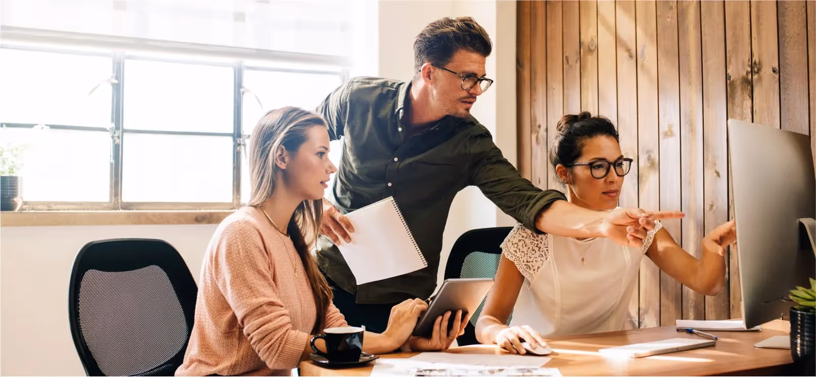 Coworking office spaces with state-of-the-art amenities including high-speed internet, ergonomic furniture, meeting rooms, and complimentary refreshments.