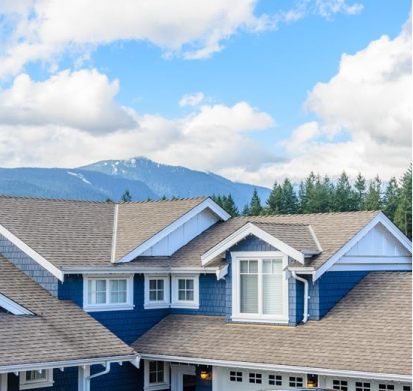 house with mountains and sky