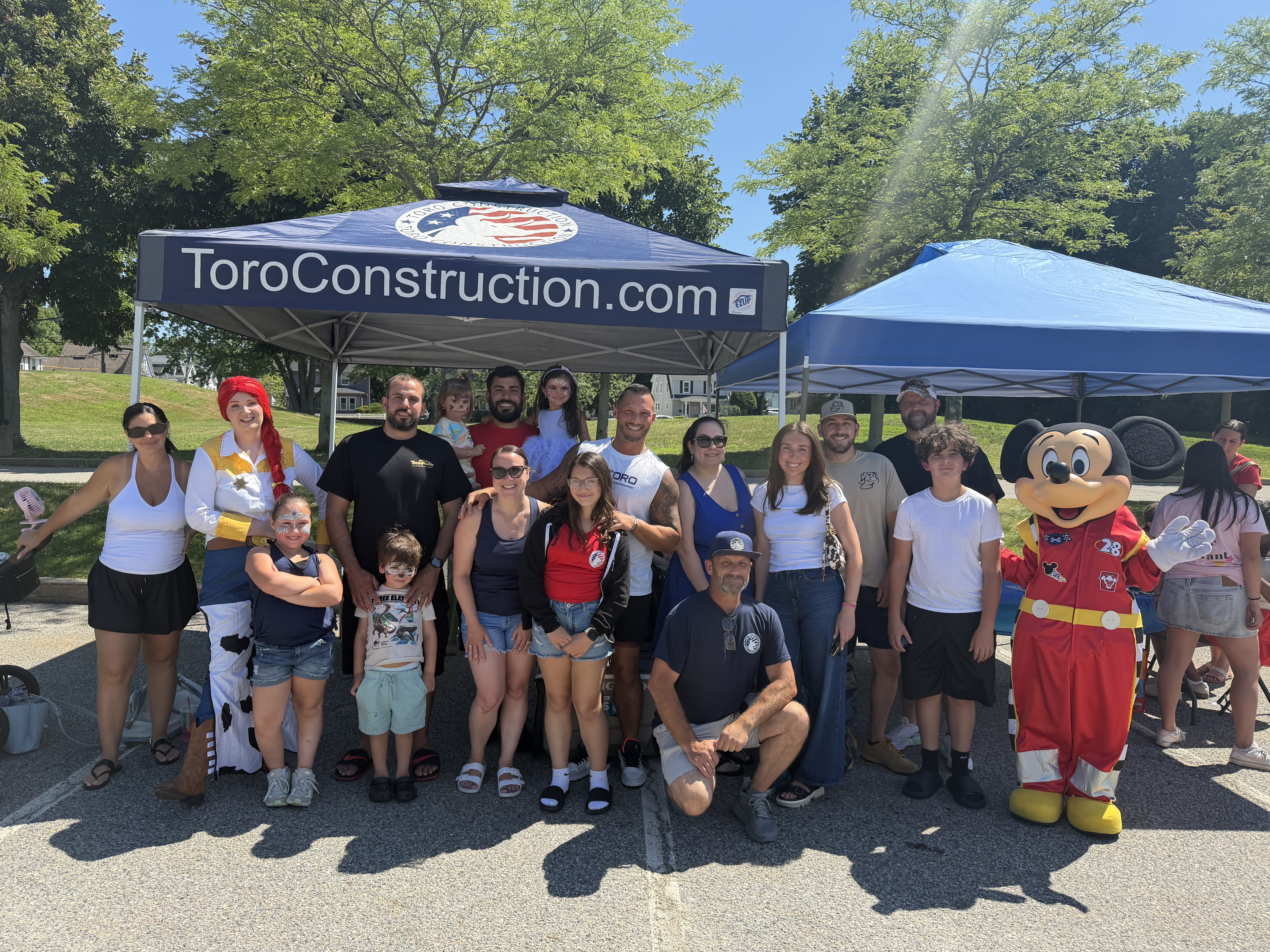 Toro Construction Ice Cream Social team with families and characters
