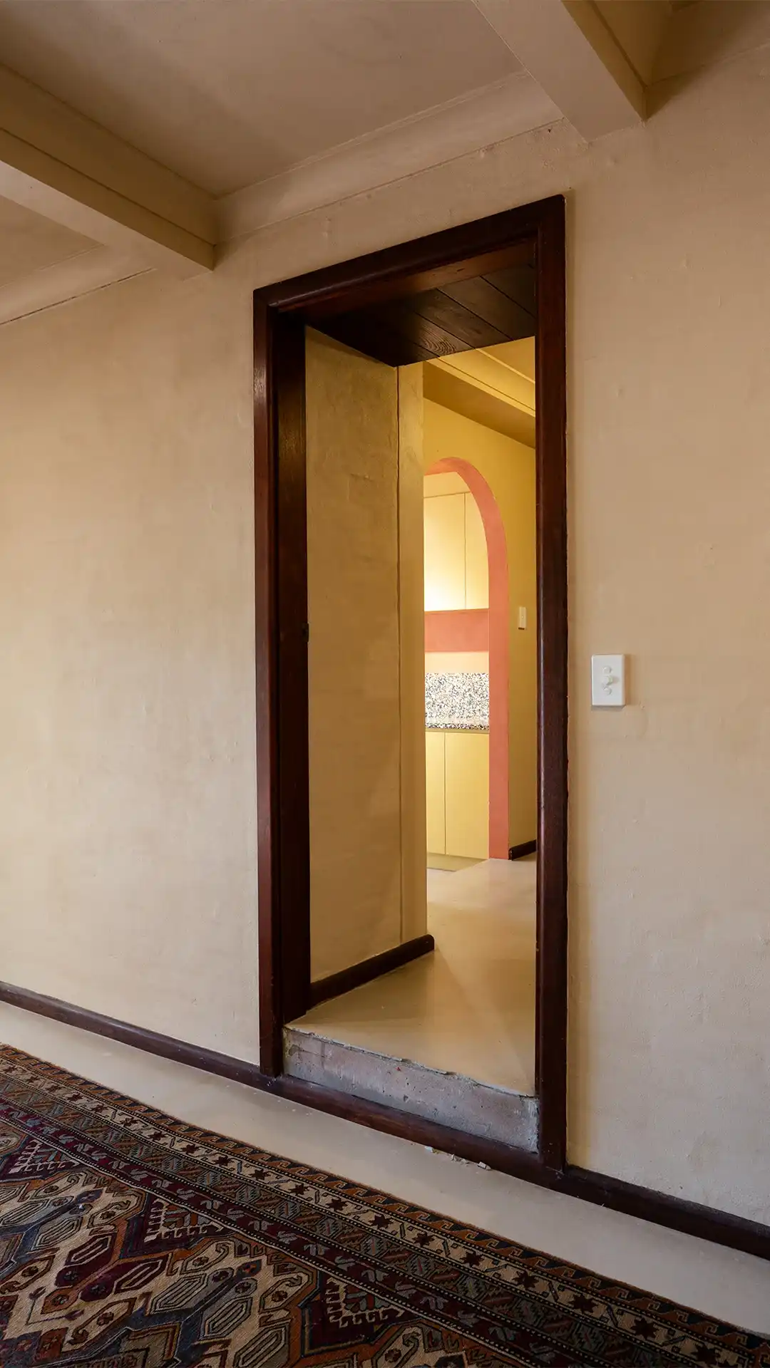 Wooden door frame and beige walls - Balgowlah Project