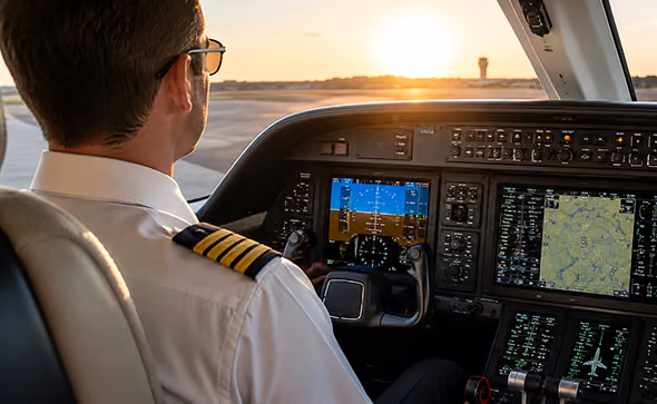 Professional airline pilot in a cockpit