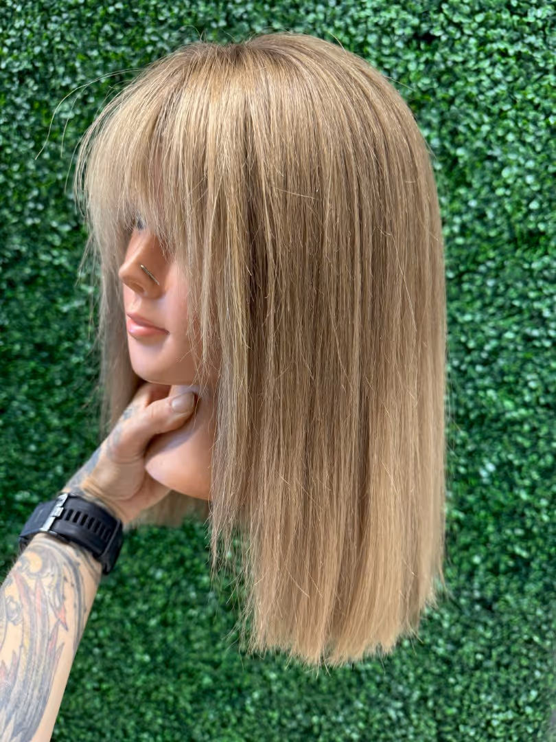 Hair topper showing natural-looking coverage and seamless blending with natural hair