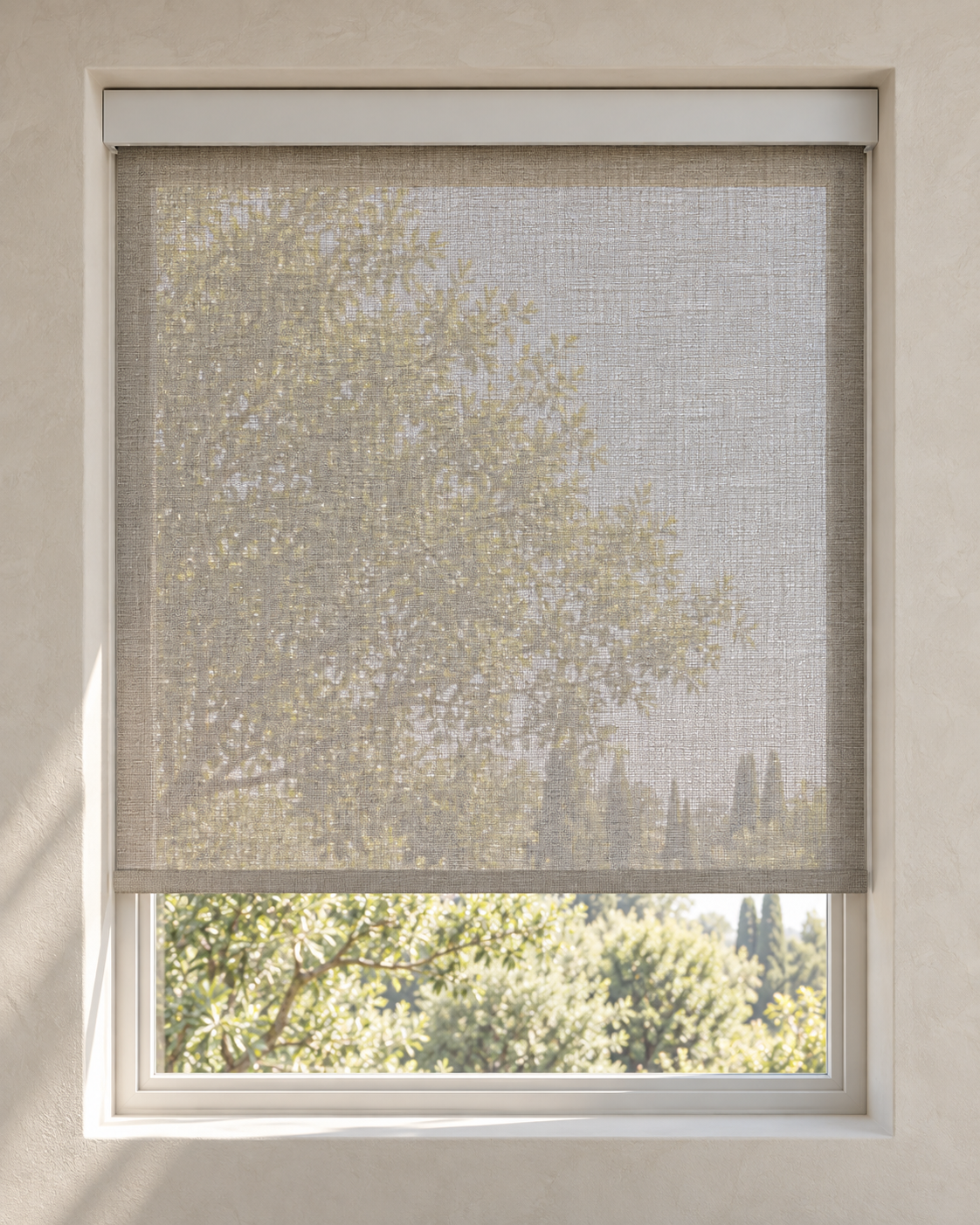 Solar roller shade with a visible garden through woven fabric, white fascia, and fabric-wrapped hem bar.