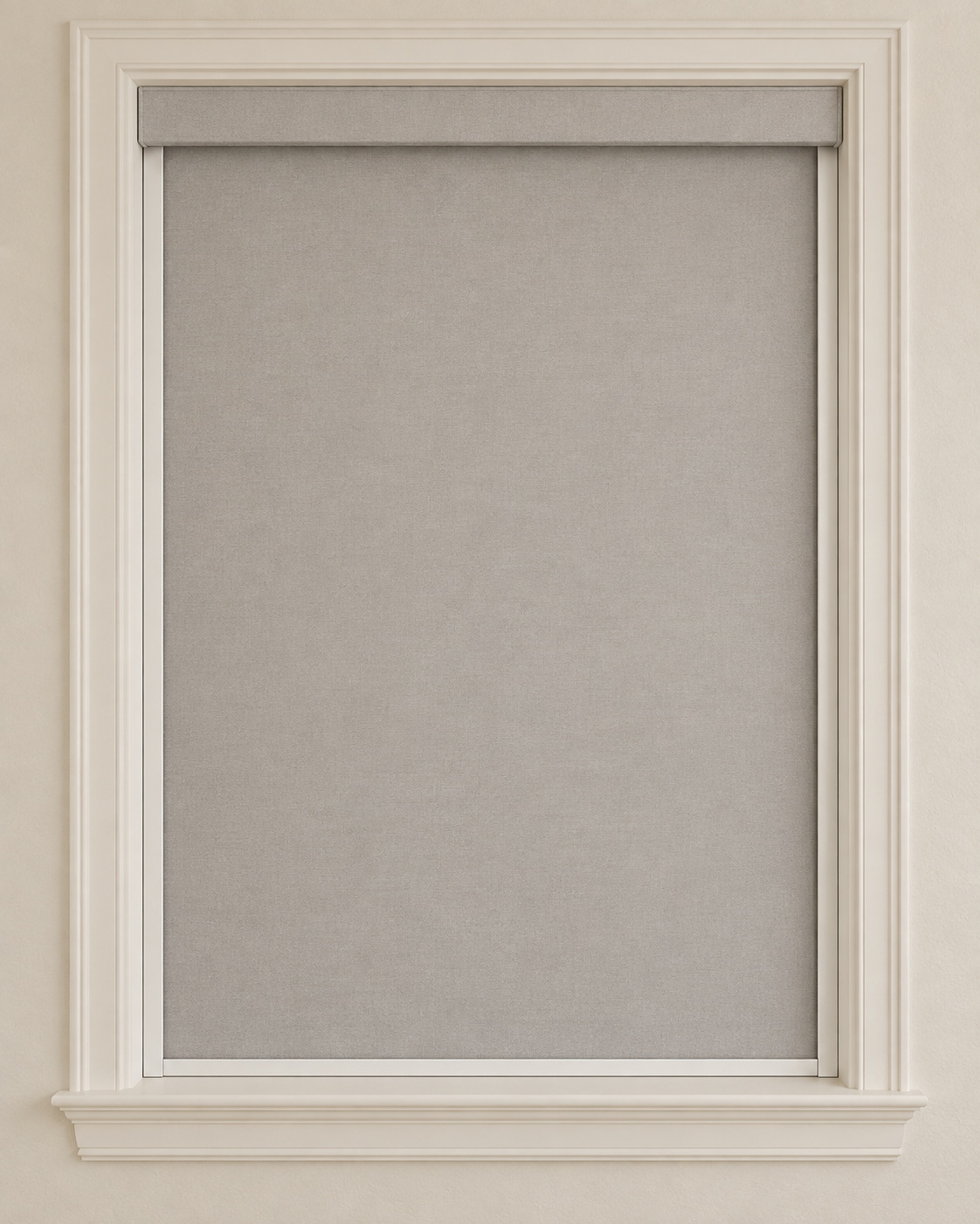 Opaque gray roller shade with visible white channels along the sides and bottom of the window.