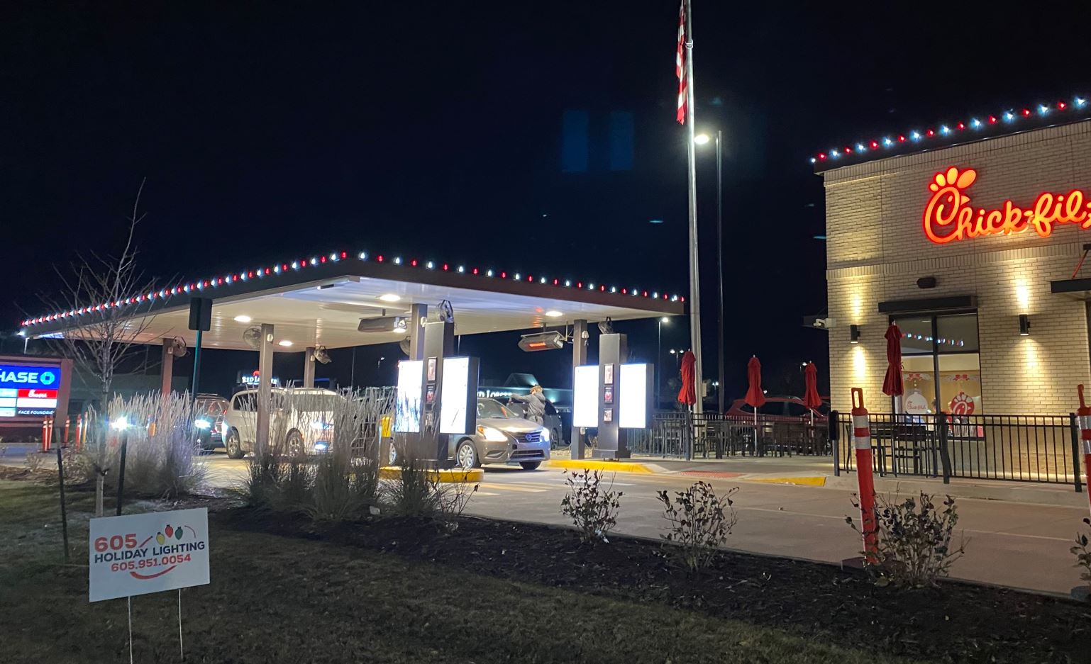 Professionally installed permanent lighting by 605 Holiday Lighting in Sioux Falls at Chick-fil-a