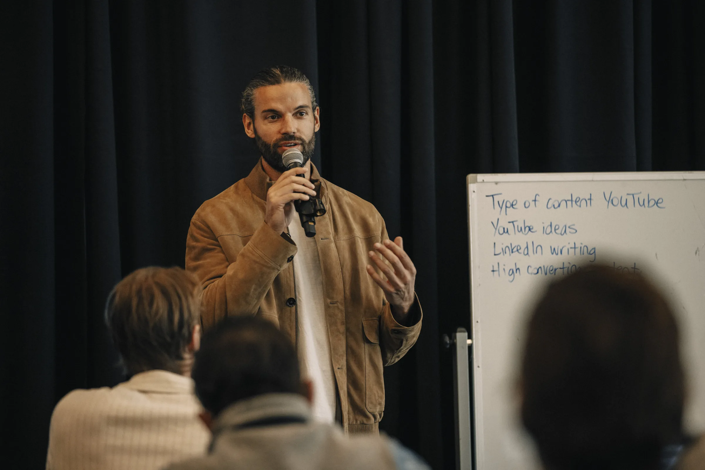 Man speaking on stage