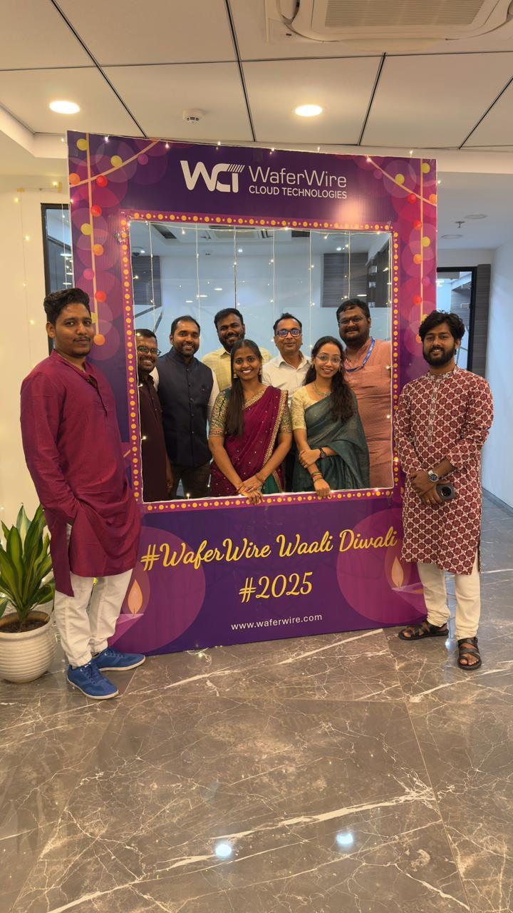 Group of eight people posing inside a large purple frame with text #WaferWire Waali Diwali #2025 and WaferWire Cloud Technologies logo at the top.